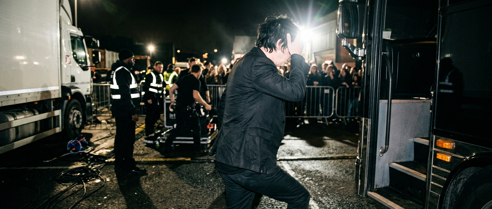 My Chemical Romance singer leans into the microphone on stage under red arena lights during their tour finale — My Chemica…